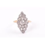 An old-cut diamond navette ring the marquise-shaped mount set with old-cut diamonds of approximately