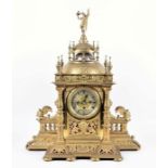 A very large and impressive 19th century Neo-Gothic ormolu clock the central dial with Roman