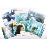 A collection of original press photographs of Queen comprising six photographs, mostly depicting