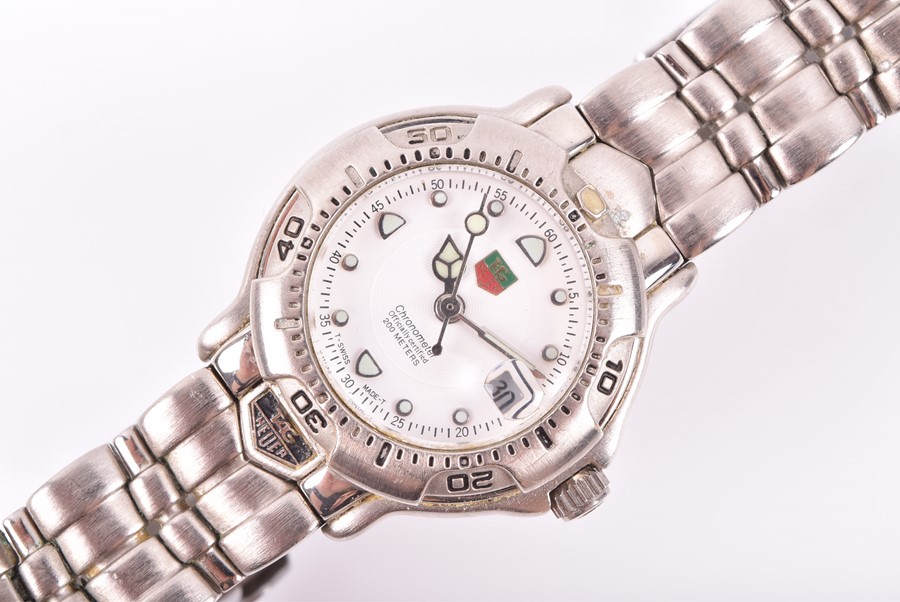 A ladies Tag Heuer automatic Chronometer wrist watch with a white dial with illuminated markers, - Image 3 of 6