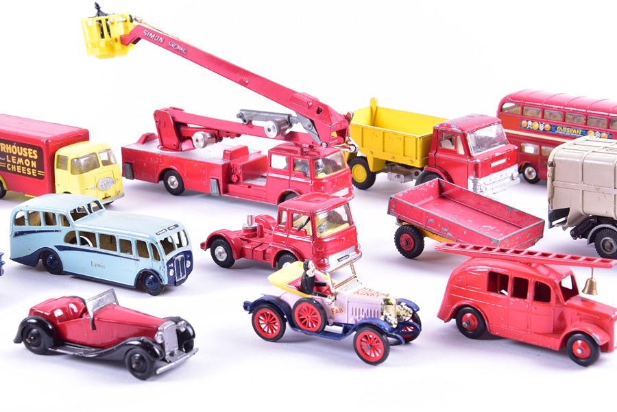 A collection of loose and playworn Dinky diecast vehicles to include buses, fire engines, commercial - Image 5 of 8