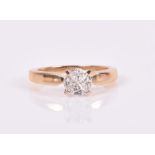 An unusual four stone diamond ring set with four quatre-cut diamonds forming a circle, of