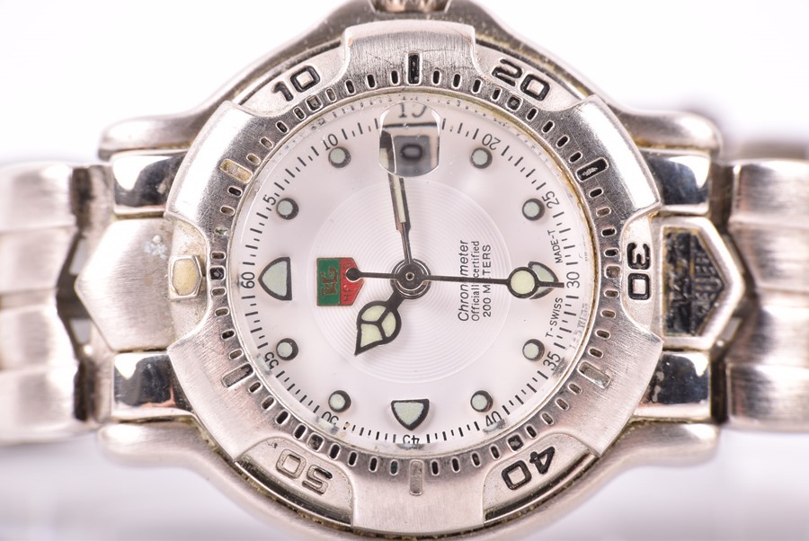 A ladies Tag Heuer automatic Chronometer wrist watch with a white dial with illuminated markers, - Image 5 of 6