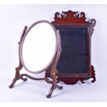 A Georgian wall mirror scroll frame wall mirror 68 cm high, together with an Edwardian swivel toilet