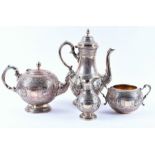 A late Victorian Scottish silver four-piece tea set Edinburgh 1880 and 1889, by Brook & Son,