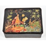 A mid 20th century Russian Palekh lacquer box depicting a fairy tale scene with gilt embellishment