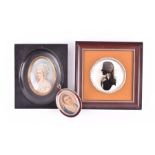 A late 19th century enamelled silver framed miniature portrait depicting a well groomed gentleman,
