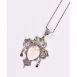 A silver and plique-a-jour style style pendant necklace in the form of two birds, together with a