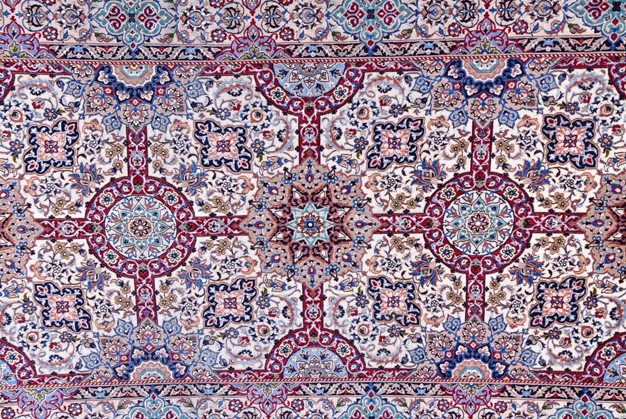 A contemporary Iranian part silk carpet with fringed ends, the ivory field decorated with a stylised - Image 3 of 5