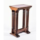 A Victorian nest of four mahogany tables the panelled rectangular tops above four turned legs with