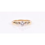 An 18ct yellow gold and diamond ring rubover set to centre with a round-cut diamond of approximately