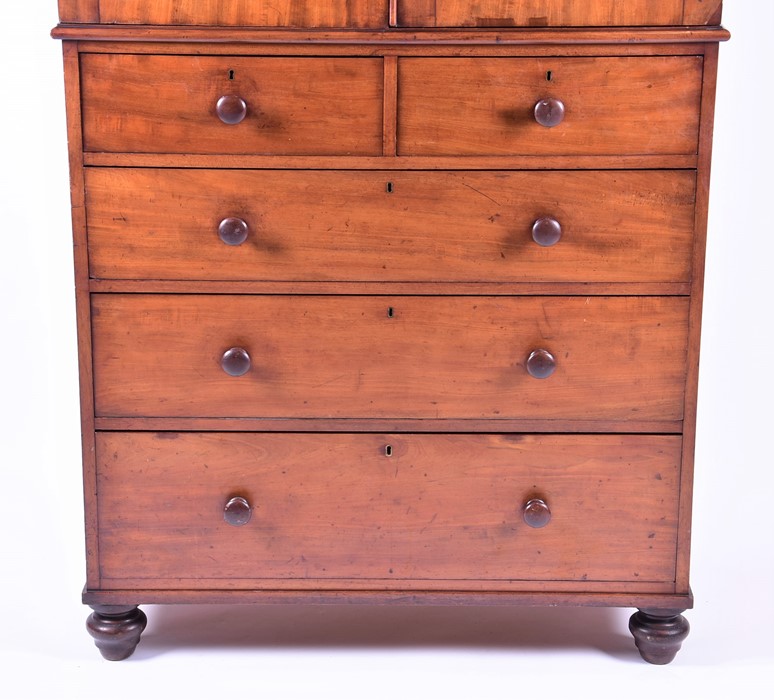 A 19th century mahogany linen press with two cupboard doors over two short and three graduated - Image 2 of 7