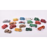A collection of eighteen loose playworn Dinky diecast vehicles to include four Trojan vans with