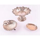 A Victorian silver footed dish London 1888, with crawling floral borders, the pierced body with