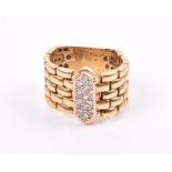 An unusual yellow metal and diamond chain-link ring the central elongated segment pave set with