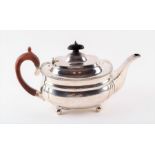 A early 20 th century silver tea pot London 1914, by Wilson and Sharp, of plain decoration with