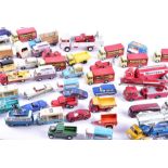 A large quantity of loose and playworn Corgi Toys diecast vehicles to include advertising vans,