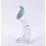 A 20th century clear and coloured Daum glass study of a bird standing on a rectangular base, etch