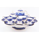 An early 20th century Royal Worcester porcelain tea set to include: teapot, sugar bowl, milk jug,
