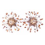 A pair of 20th century French wall lights holding six lights, decorated with glass flowers and