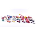 A collection of loose and playworn Dinky diecast vehicles to include buses, fire engines, commercial