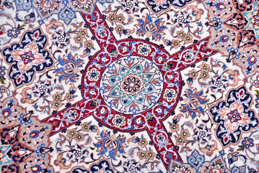 A contemporary Iranian part silk carpet with fringed ends, the ivory field decorated with a stylised - Image 4 of 5