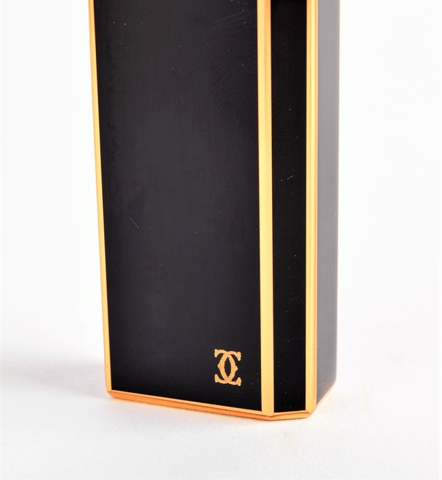 A Cartier lighter with its original box of pentagon form, 18k gold plate and black enamel - Image 5 of 5