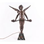 After Auguste Moreau: `Vici` a spelter winged cupid with bow, standing on an angular marble base