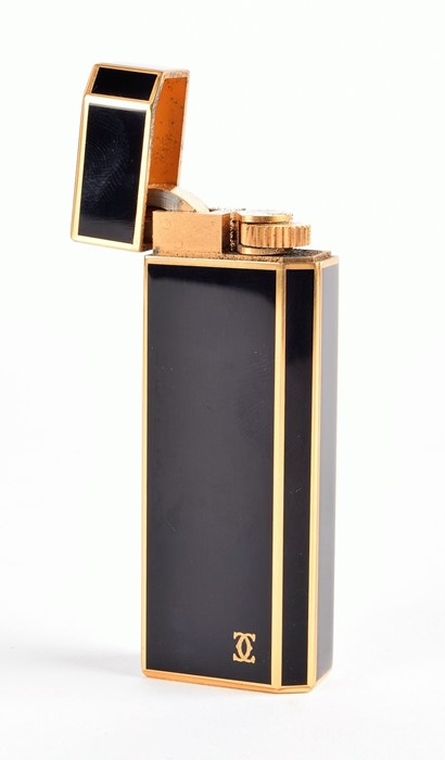 A Cartier lighter with its original box of pentagon form, 18k gold plate and black enamel - Image 3 of 5