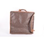 A Louis Vuitton soft sided folding travel bag the interior with dress or suit carrier, monogram