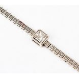 A diamond bracelet centred with a square-cut diamond of approximately 1.50 carats, approximate