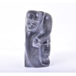 An Inuit soapstone carving by Joshua Joe modeled as a hunter. 19 cm high.