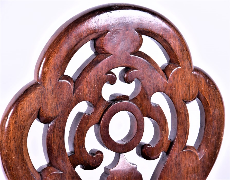 A pair of mahogany pierced back hall chairs with serpentine-fronted seats on turned front legs, 20th - Image 2 of 4