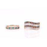 A 9ct yellow and chocolate diamond ring the waved mount set with rows of brown and white diamonds (