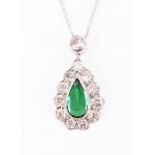 A diamond and emerald pear-shaped cluster pendant set with a faceted pear-cut emerald of