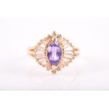 An 18ct yellow gold, diamond, and amethyst ballerina ring centred with a marquise-cut amethyst,