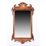 A 19th century style oak and walnut wall mirror with gilt bird and fretwork surmount, 92 cm x 49