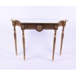 A small gilt console table with mirrored top 20th century, with moulded frieze on fluted, tapering