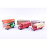 Three boxed Dinky Toys diecast vehicles comprising 917 "Spratt's" Guy Van, 514 "Slumberland" Guy Van