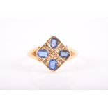 An Edwardian 18ct gold and sapphire ring hallmarked Chester 1909, set with four cornflower blue