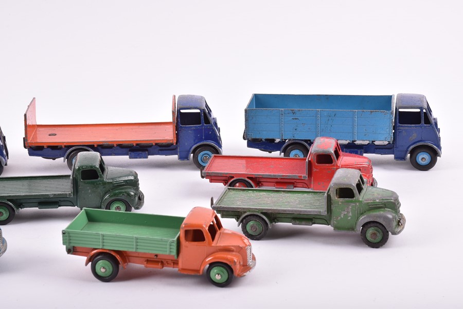 A collection of loose and playworn Dinky Toys vehicles to include three 422 Fordson Trucks, a 533 - Image 2 of 4