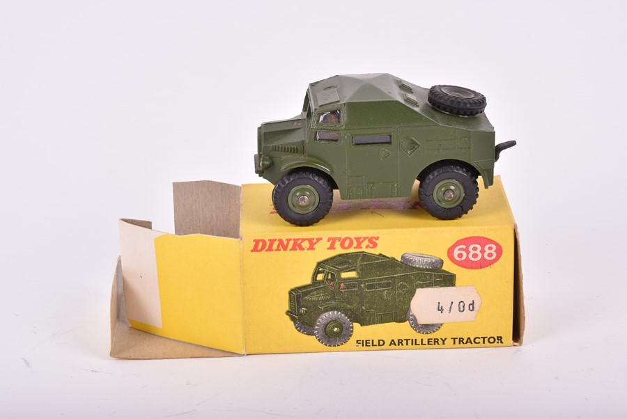 Three Dinky Toys boxed military vehicles comprising a 674 Austin Champ, a 673 Scout Car and a 688 - Image 9 of 14