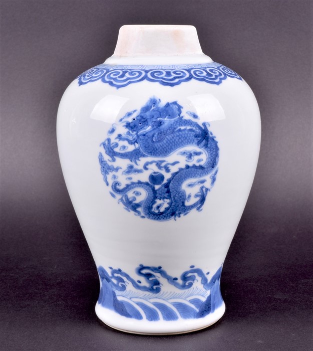 A Chinese Kangxi period blue and white baluster jar the body decorated with three roundels depicting - Image 2 of 7