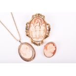 A group of three carved cameo pendants the largest depicting the three graces, in a scrolled