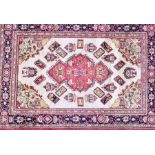 A small Iranian silk rug designed with an ivory field of colourful carpets and lanterns with central