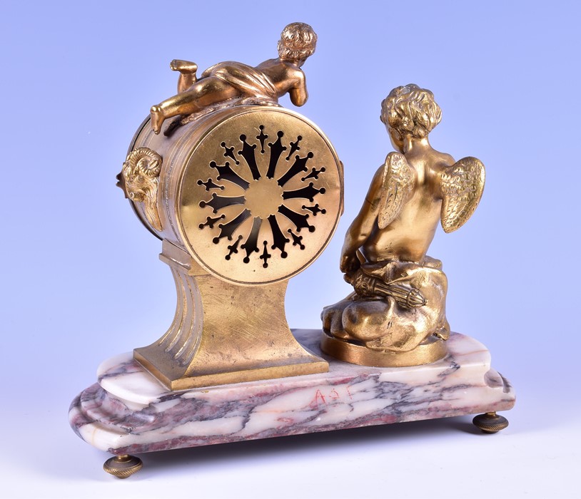 A 19th century French ormolu drum shaped mantel clock the white enamel dial with painted flowers, - Image 6 of 7