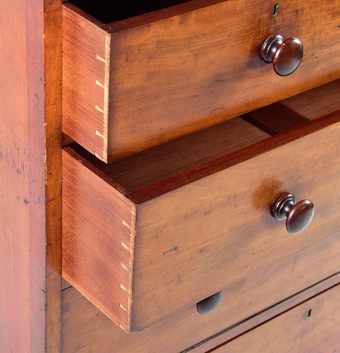 A 19th century mahogany linen press with two cupboard doors over two short and three graduated - Image 6 of 7