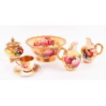 A collection of Royal Worcester blush ivory porcelain comprising a small bowl, 18 cm diameter, two