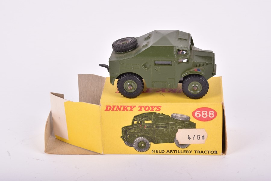 Three Dinky Toys boxed military vehicles comprising a 674 Austin Champ, a 673 Scout Car and a 688 - Image 10 of 14