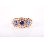 An 18ct yellow gold and blue gemstone ring size J, 2.9 grams.CONDITION REPORTblue stones abraided;